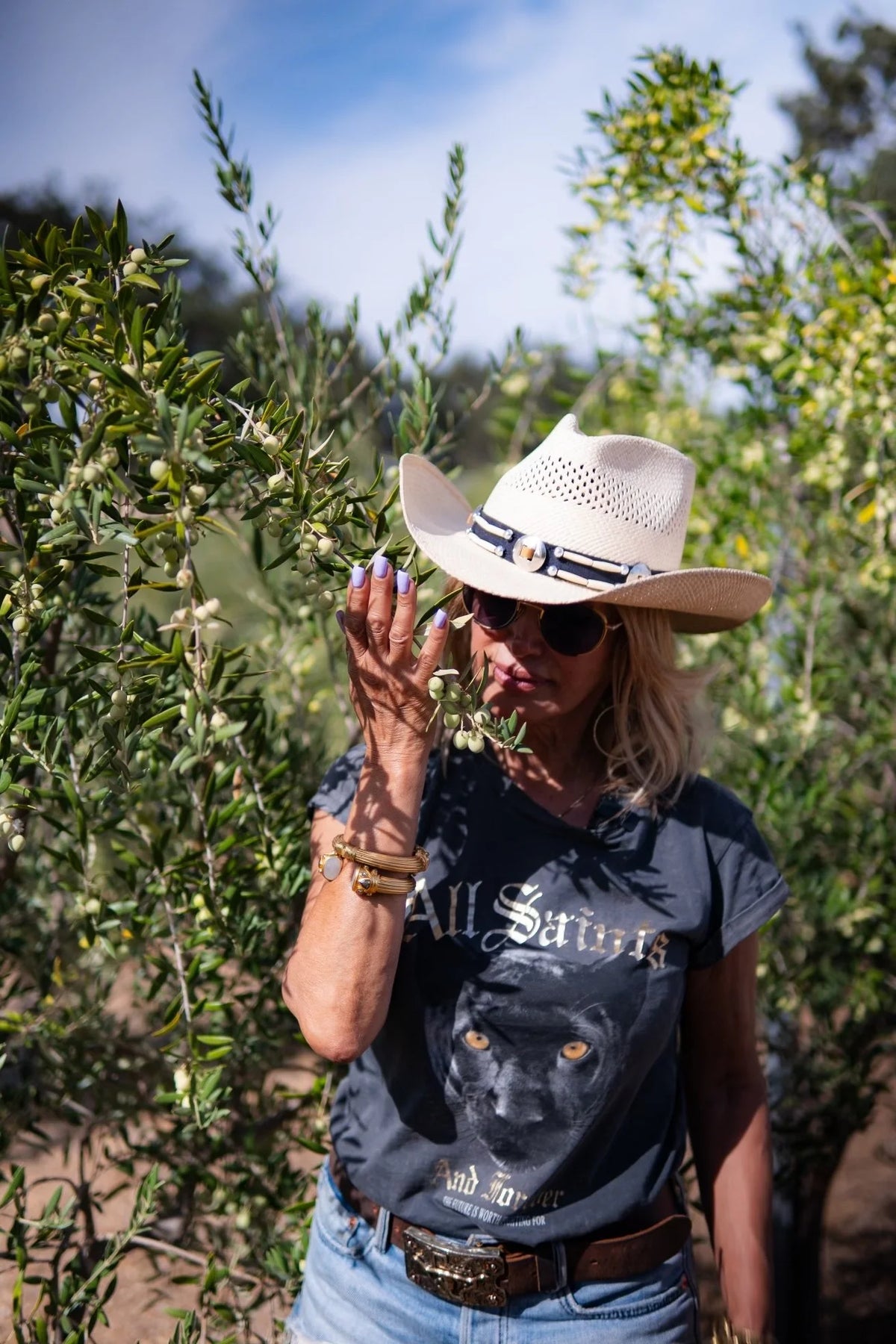 Mahnaz Westerberg among the olive trees on the ranch